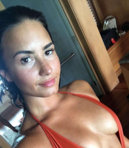 Demi Lovato Busts Out Of Her Swimsuit!