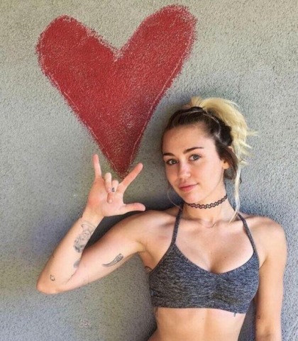 Miley Cyrus In A Tiny Sports Bra
