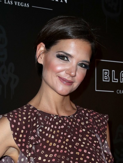 Katie Holmes is serious with Jamie Foxx, but would 'choose her family over him'