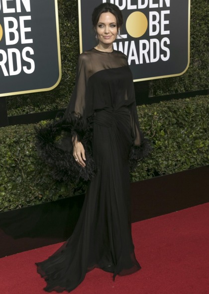 Angelina Jolie wore a fab, feathered black Versace to the Golden Globes