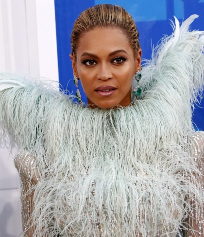 Beyonce thinks it's 'sweet' that we care so much about who bit her face