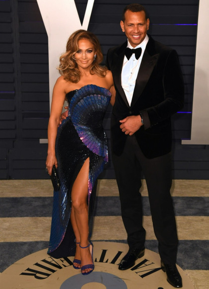 Jennifer Lopez in Zuhair Murad at the VF Oscar party: still glum or perked up?