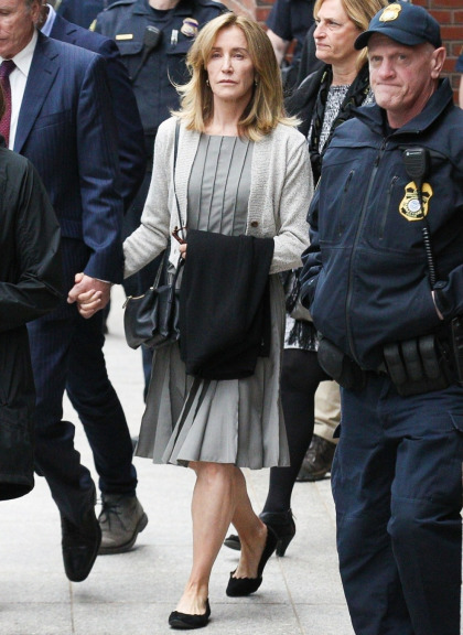 Felicity Huffman wept in federal court as she entered her guilty plea