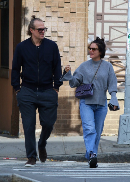 David Harbour and Lily Allen show major PDA and a manbun
