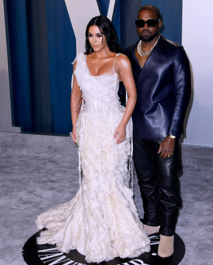 Kim Kardashian in McQueen at the VF Oscar party: wet-look fuggery?