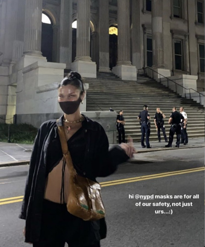 Bella Hadid flipped off some NYPD cops because they weren't wearing masks