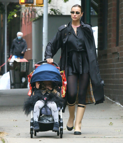 Irina Shayk's street style involves $3K Burberry raincoat & $2K Chanel boots