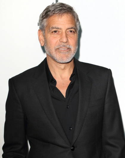 George Clooney claims he's been cutting his hair with a Flowbee for years