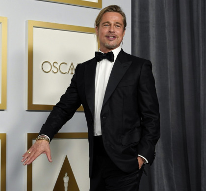 Brad Pitt looked especially fresh-faced at the Oscars following his 'wisdom teeth removal'